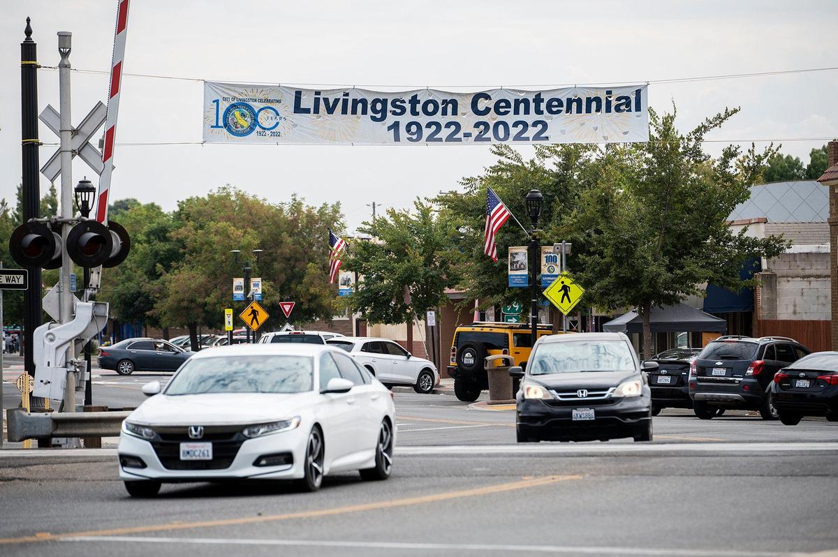 A banner celebrating the City of Livingston’s 100th anniversary is displayed above North Mains Street in Livingston, Calif., on Sunday, Sept. 11, 2022.