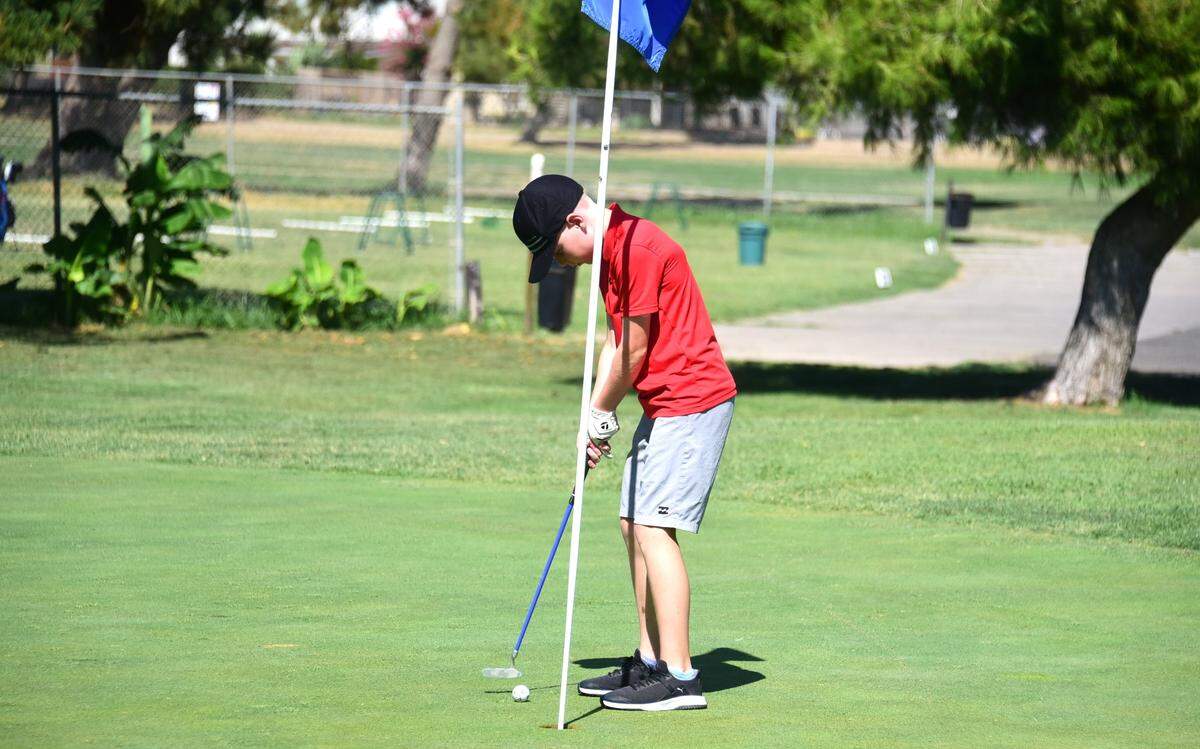 Atwater resident Reid Runyon putts on the 18th green during his round of golf at the Rancho Del Rey Golf Club on Tuesday, July 30, 2024.