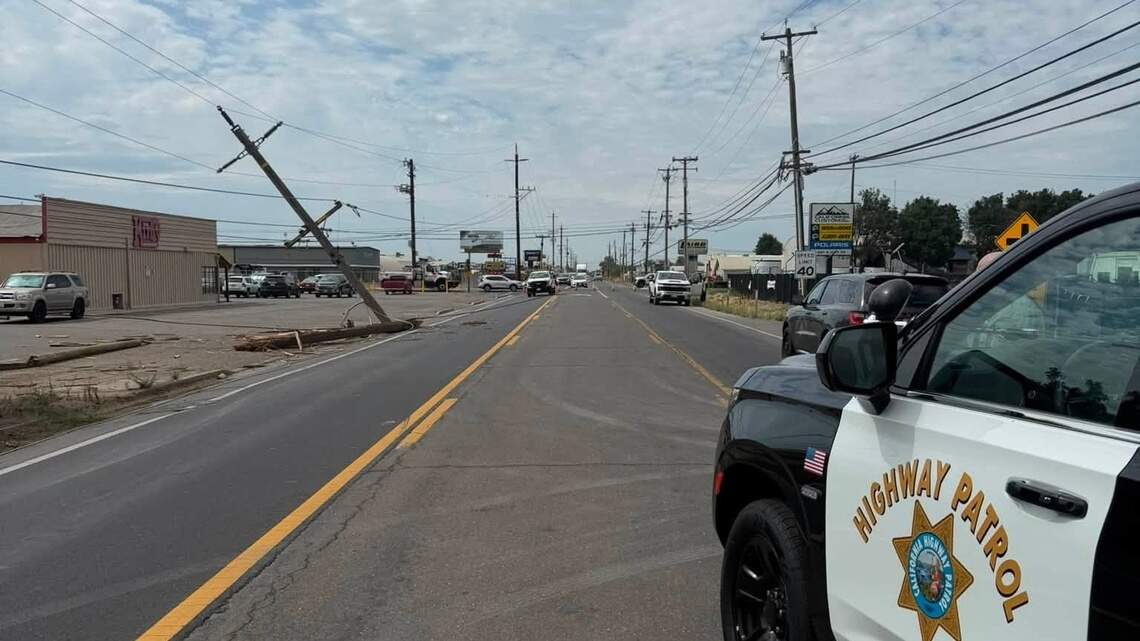 Vehicle crashes into pole in Merced County, causing roadway closure