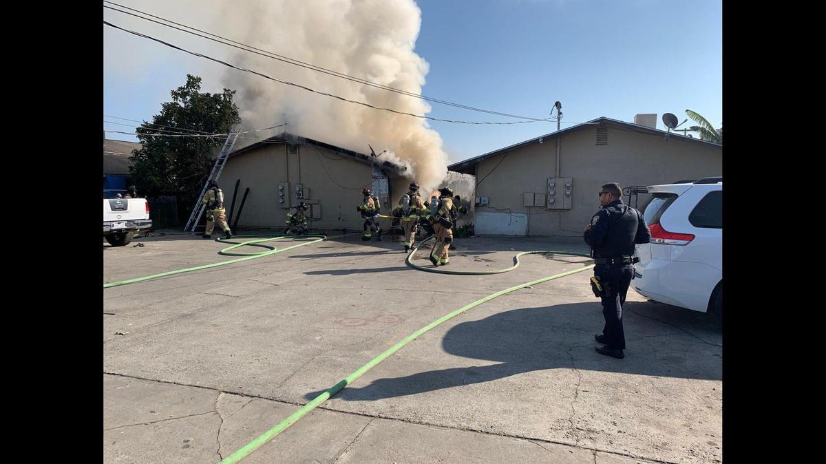Multiple people have been displaced from an adjacent residence after a structure fire damaged a boarded up unit at a duplex in the 1000 block of K Street in Merced on Monday, according to Merced Fire Chief Derek Parker. The cause of the fire remains under investigation. Image courtesy of City of Merced Fire Department.