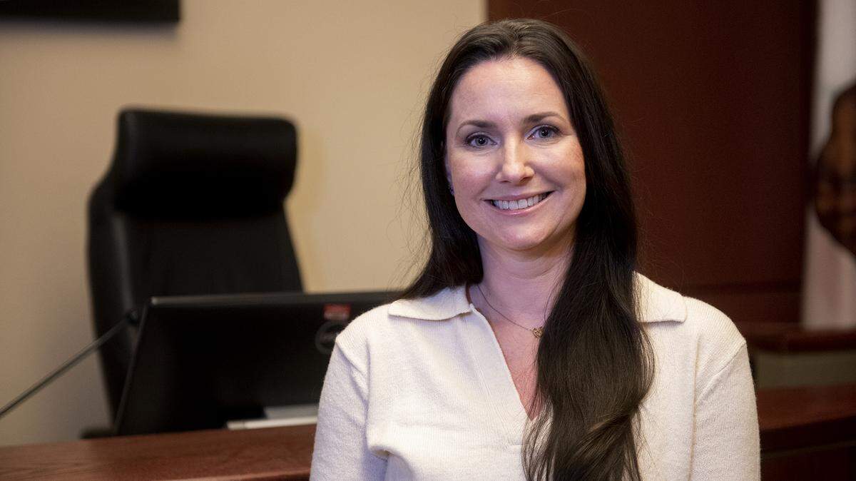 Merced County Deputy Public Defender Stephanie Jamieson, poses for a photo inside a courtroom at the Merced County Courthouse in Merced, Calif., on Thursday, Dec. 2, 2021. Jamieson was selected by Gov. Gavin Newsom to serve as a Merced Superior Court judge.