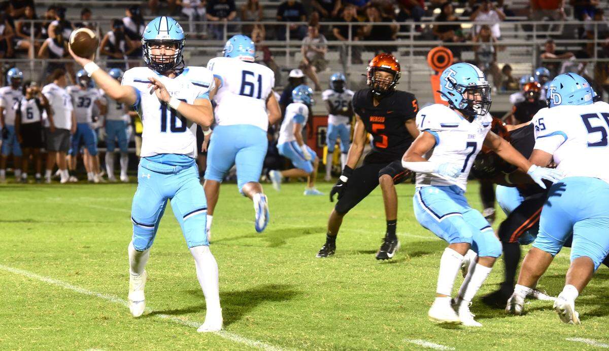Downey High quarterback Carson Lamb (10) throws a pass during a game against Merced on Sept. 6, 2024. Lamb threw four touchdowns to lead the Knights to a 48-34 win.