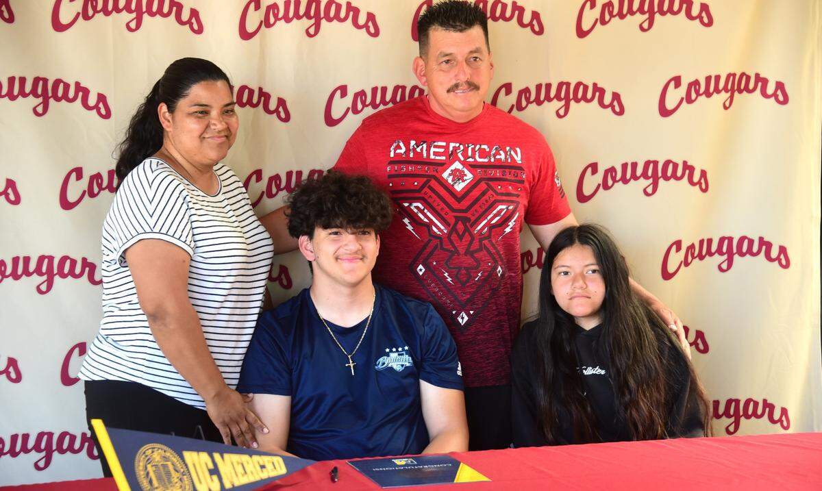 Golden Valley High senior Manuel Zarco-Zarate (center ) signed his national letter of intent to play soccer at UC Merced. Here he is pictured with his mother Maria Zarate, father Paul Zarco and sister Nathalia Zarco-Zarate.