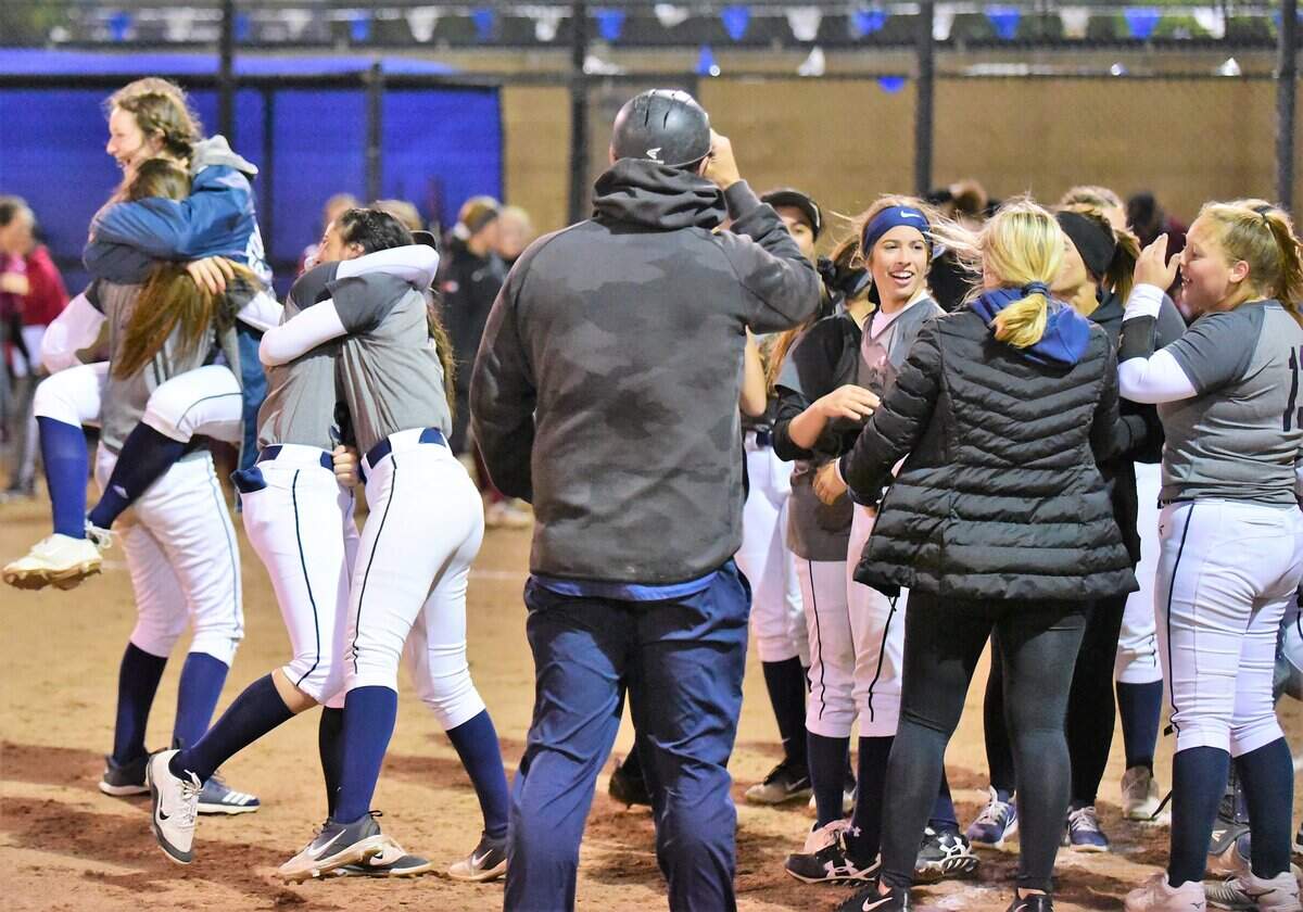 The Stone Ridge Christian softball team celebrates after winning their first Sac-Joaquin Section Division VII championship in school history on Tuesday, May 21, 2019 at the Arnaiz Softball Complex in Stockton, Calif.