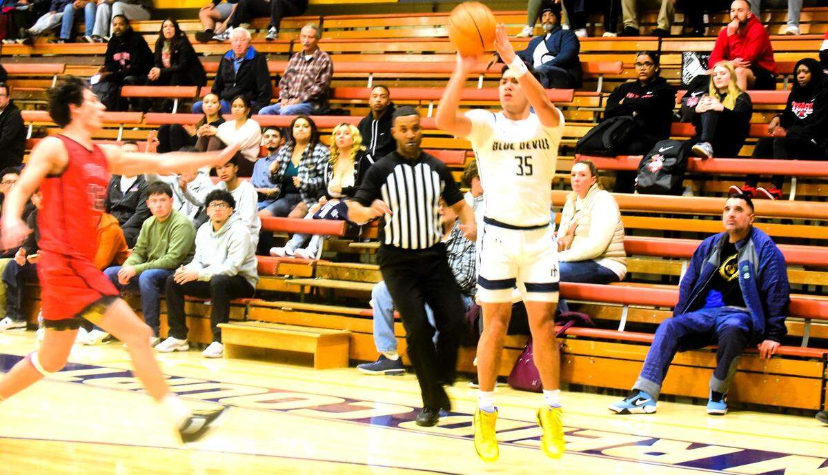 Merced College sophomore Mateo Tangaan attempts a three-pointer during a 124-108 loss to Fresno City on Wednesday, Jan. 10, 2024 at Don Reid Court.