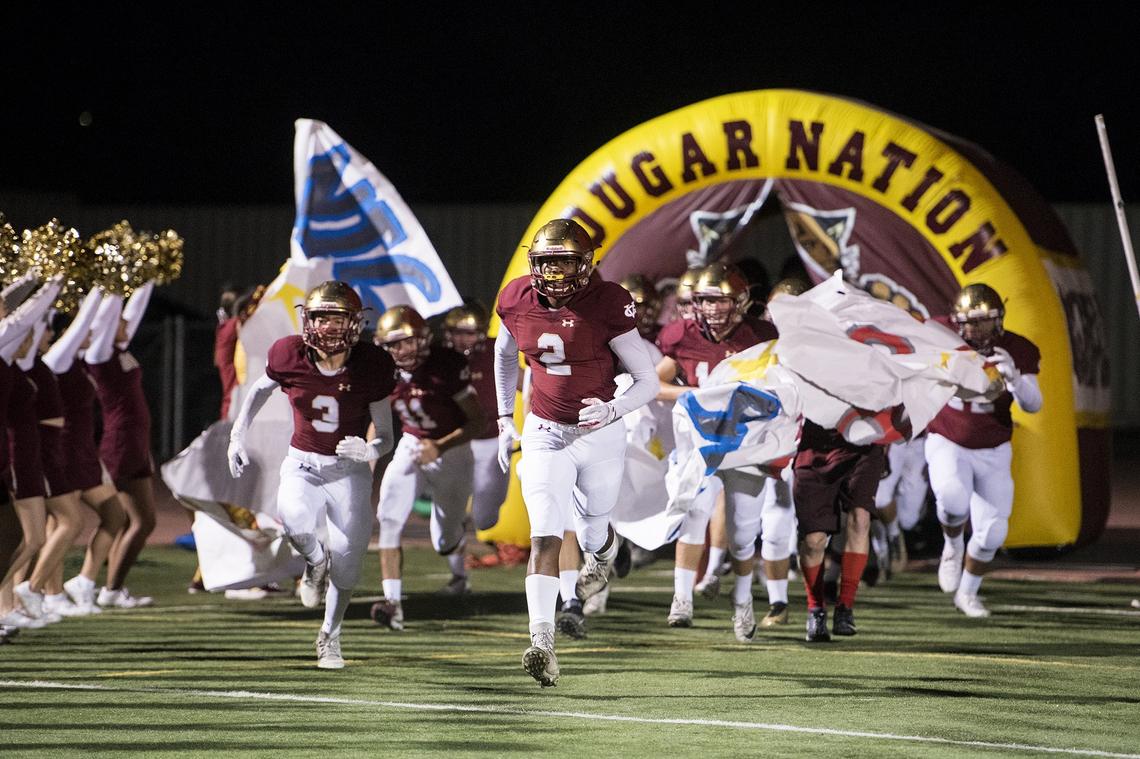 Golden Valley senior Etrell Bowers (2) leads the team onto the field during a game against Cordova in the CIF Sac-Joaquin Section Playoffs at Golden Valley High School in Merced, Calif., on Friday, Nov. 2, 2018.