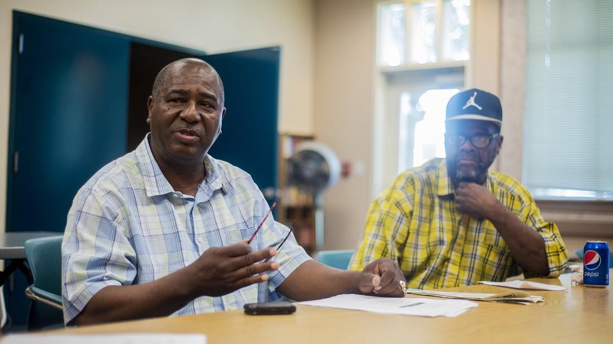 South Merced Community Council member Antoine Hubbard Sr., left, discusses the arrest of William Colbert, a black man who says he was beaten by Merced police, during a press conference at the Merced Senior Community Center in Merced, Calif., on Wednesday, May 9, 2018. Colbert, a 39-year-old Merced man, was arrested by police for allegedly resisting arrest after a store clerk called authorities when Colbert argued with the employee over the payment at the AM-PM mini-store on G Street in Merced on March 12. Colbert claims he was brutalized by more than one officer the evening of the 12th and that he committed no crimes.