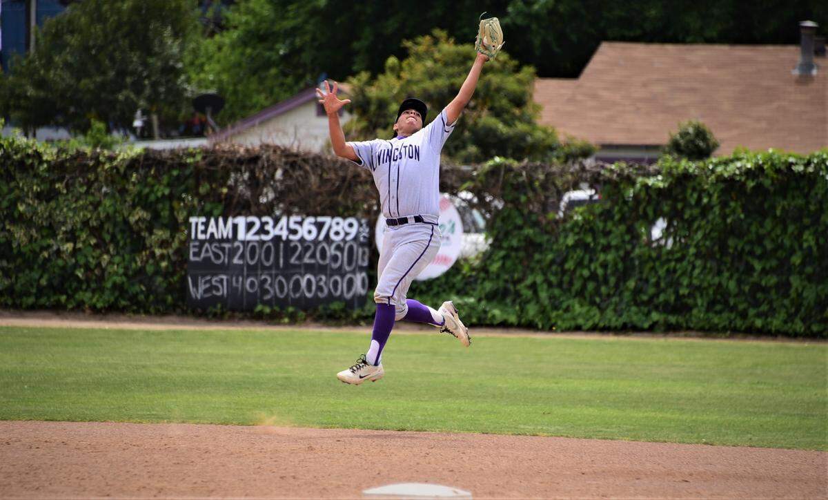 Livingston High shortstop Andrew Aguilar makes a leaping catch during a game against Golden Valley on Monday, Aug. 18, 2022 at Memorial Ballpark in Atwater, Calif.
