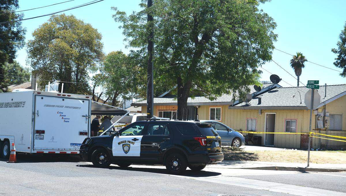 The Merced Police Department Crime Scene Response Team investigates a home on Monday, July 15, 2019, in the 1600 block of Merced Avenue in connection to a homicide the night before.