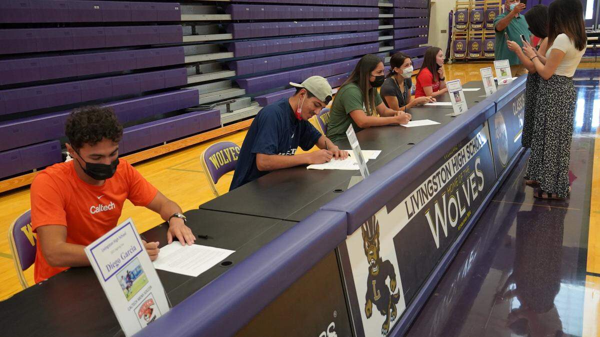 Livingston High seniors Diego Garcia, Yareth Martinez, Breanna Espinoza, Alizabeth Huerta and Rebecca Sobrevilla all recently signed their national letters of intent to play sports at a four-year college during a ceremony in the Livingston gymnasium.