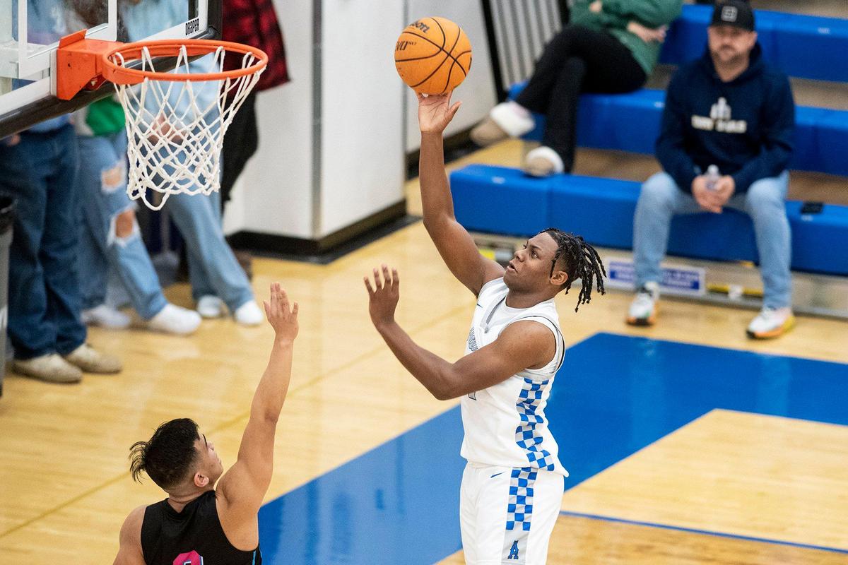 Atwater sophomore Ali Banks Jr. (4) attempts a layup during a game against El Capitan at Atwater High School in Atwater, Calif., on Wednesday, Jan 17, 2024.