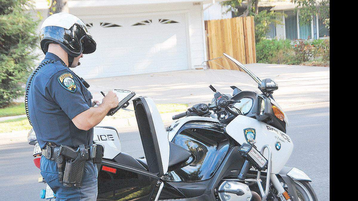 Police, fire department and public works take big hits in move to close $5.5M deficit.
