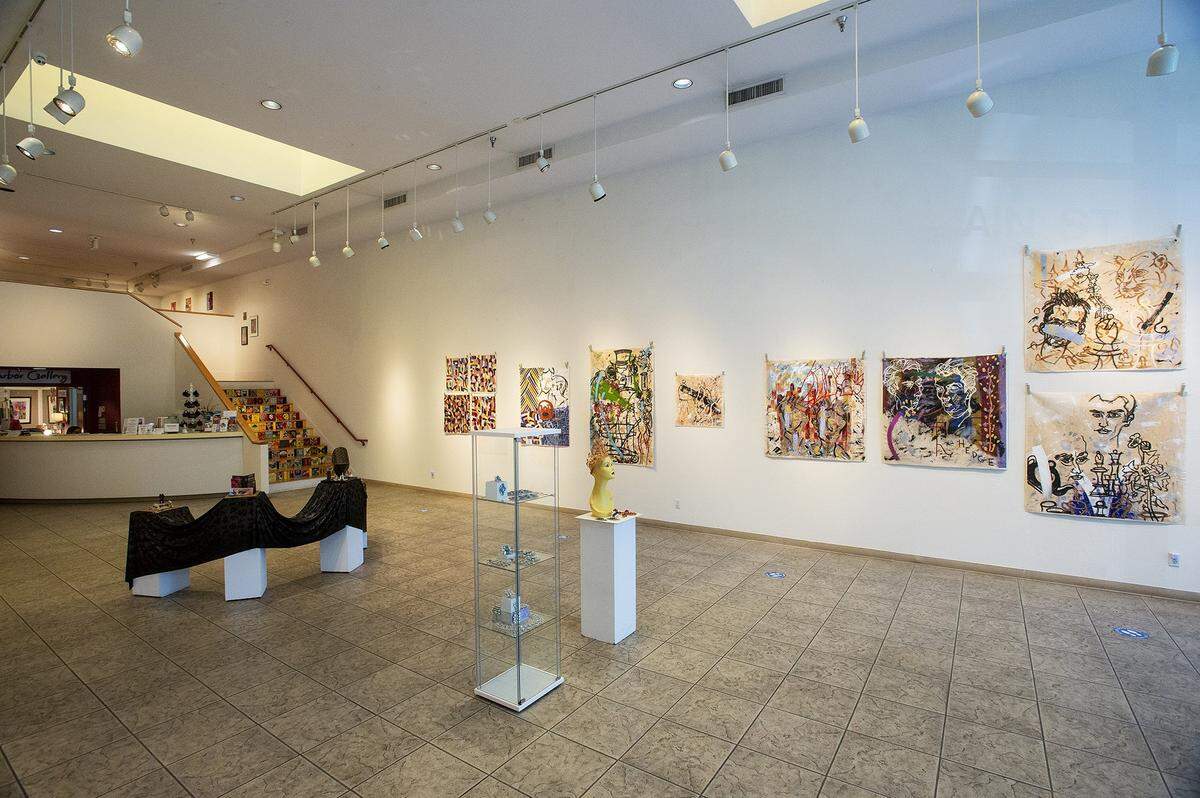 Artwork is displayed as part of the Outloud art showcase at the Multicultural Arts Center in Merced, Calif., on Wednesday, June 15, 2022. The exhibit is on display through July 24 and celebrates LGBTQIA+ artists.