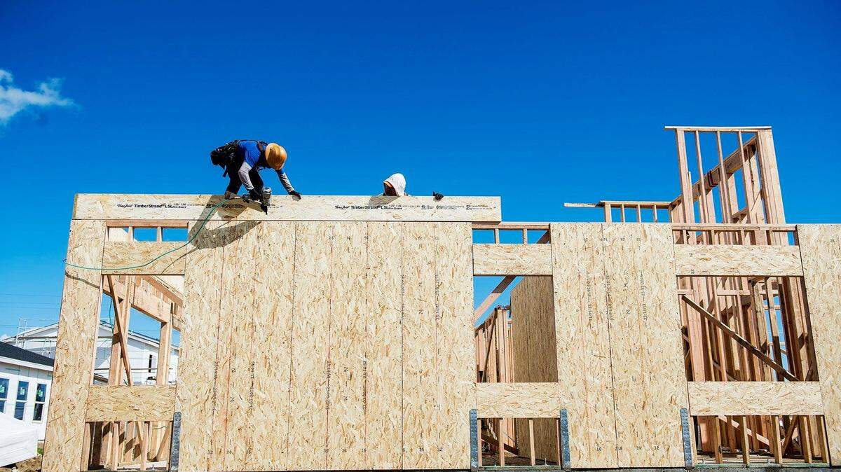 New homes under construction along Sproul Court in Merced, Calif.