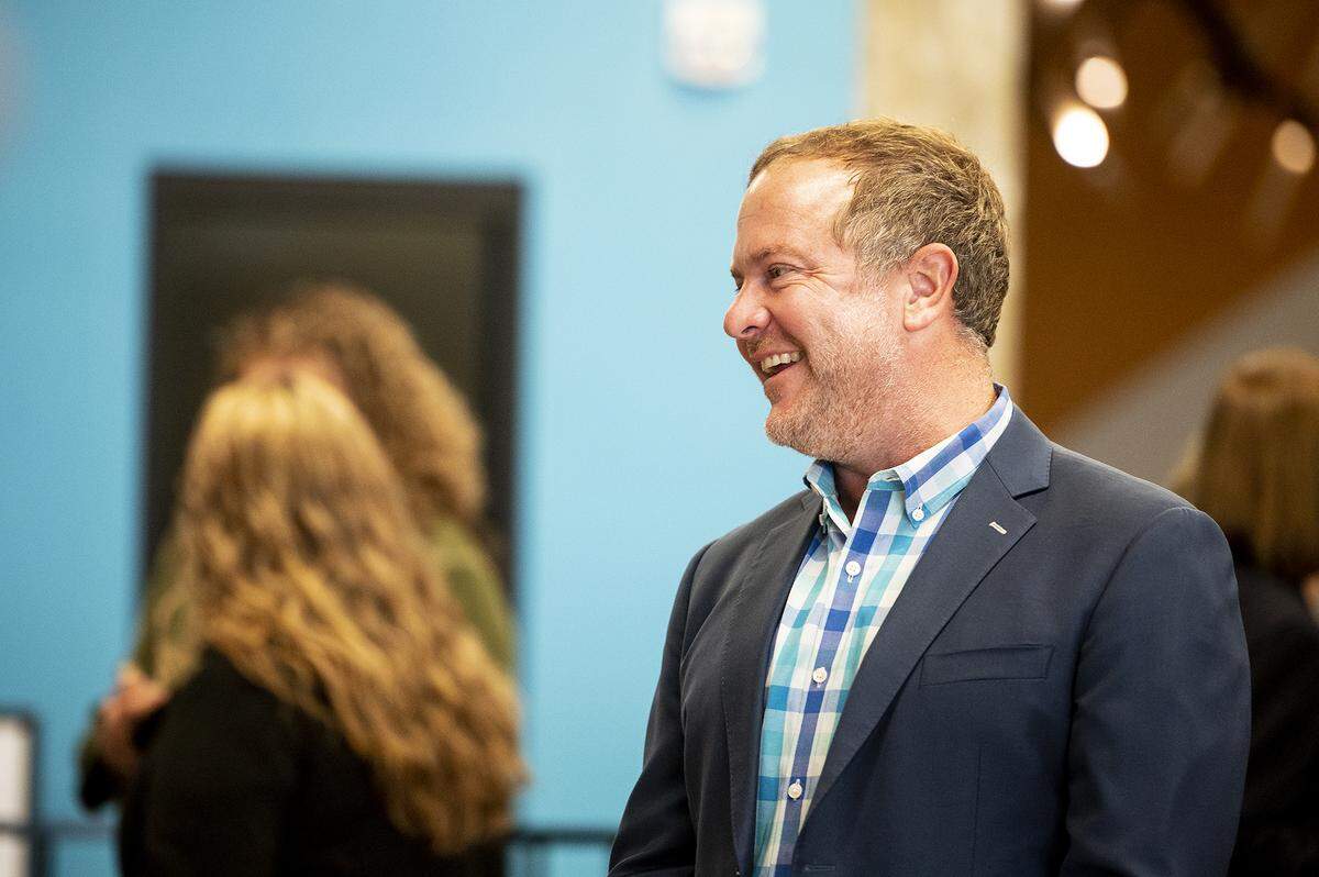 Community Foundation of Merced County President Bill Cummings speaks with attendees following a ceremony announcing former Merced city manager Stephanie Dietz as the foundation’s new Executive Director in Merced, Calif., on Wednesday, Jan. 3, 2024.