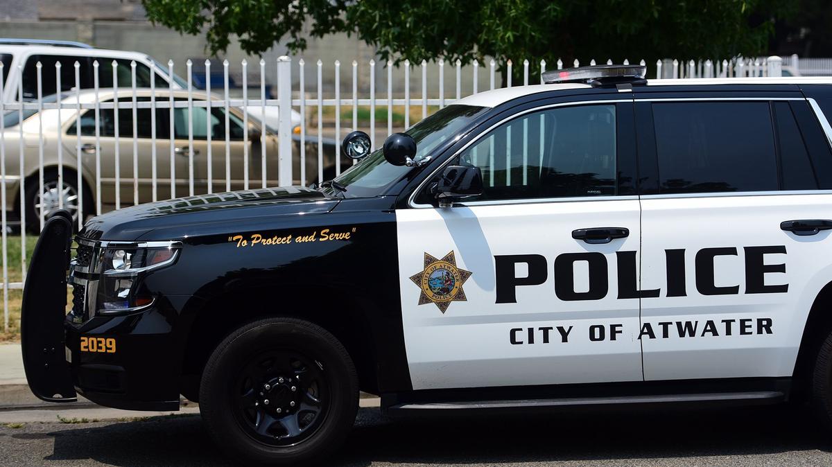 An Atwater cruiser sits nearby where a man was shot to death in Atwater around 11 a.m. Monday, July 2, 2018, near Determine Drive and Kelso Street, according to police.