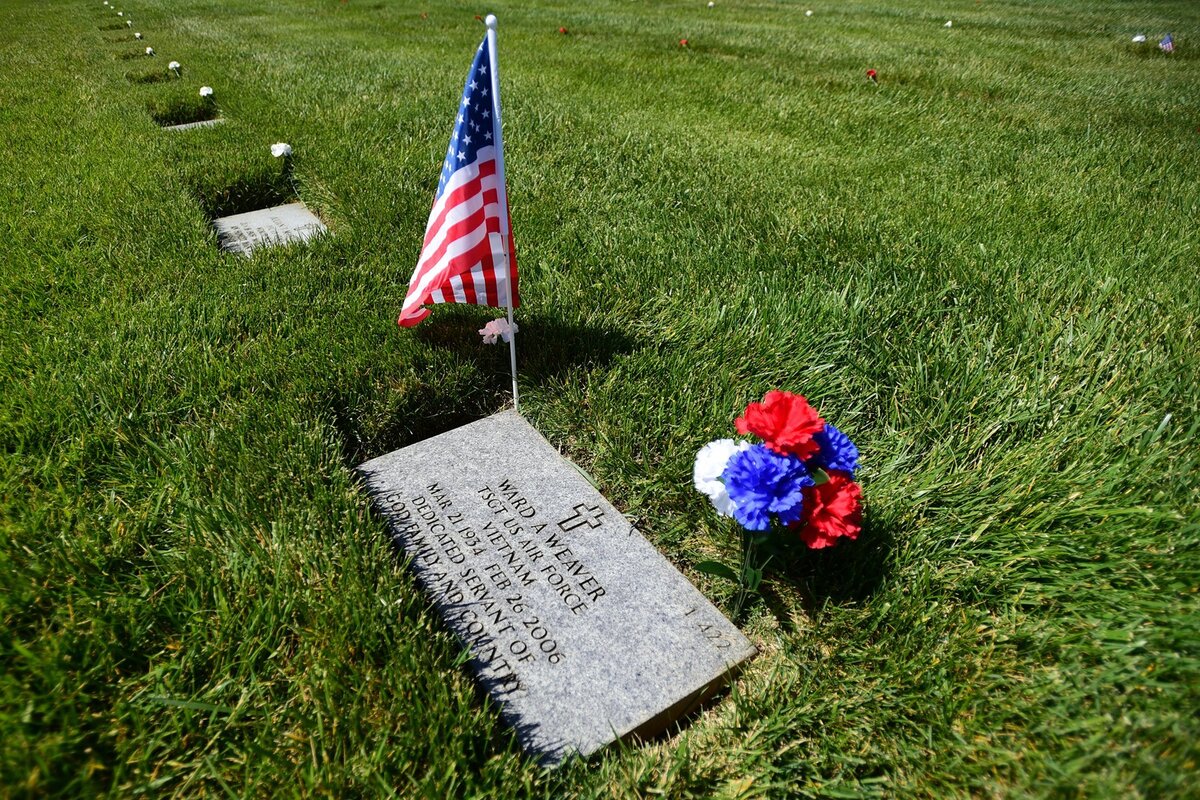 The headstone of Ward A. Weaver on Sunday, May 27, 2018, at San Joaquin Valley National Cemetery in Santa Nella following a ceremony for Memorial Day. The Air Force and Navy veteran who died in 2006 served during the Vietnam and Korea conflicts, his family said.