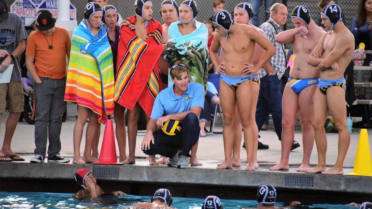 El Capitan boys water polo coach Connor Greene talks to his team during a timeout during a game against Golden Valley on Tuesday, Oct. 15, 2019.