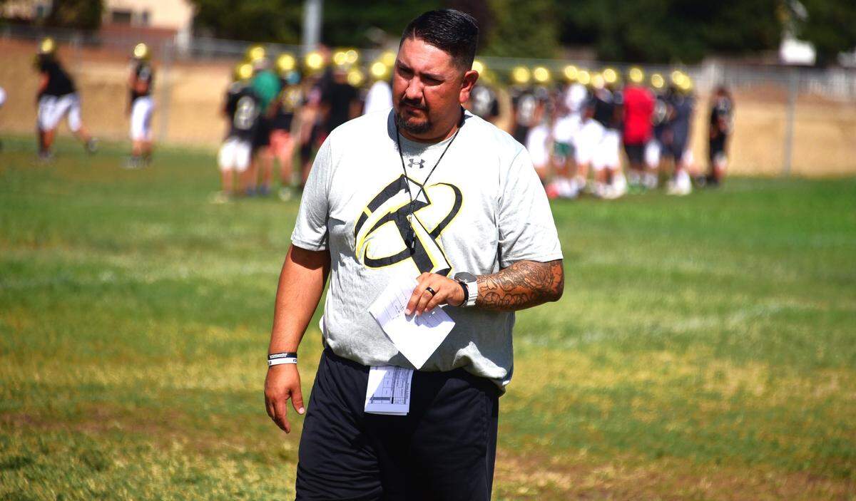Buhach Colony High second-year head coach Matt Granado guides the Thunder players through practice on Monday, Aug. 12, 2024.