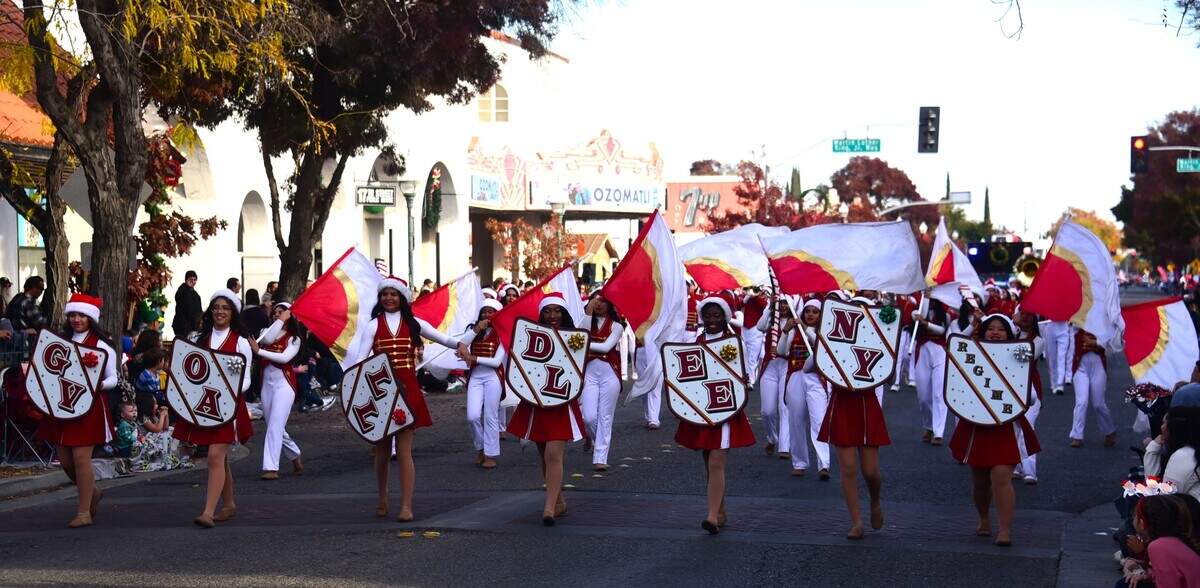 The Golden Valley High School marching band makes their way down Main Street during the annual Merced Christmas Parade on Saturday, Dec. 2, 2023 in Merced, Calif.