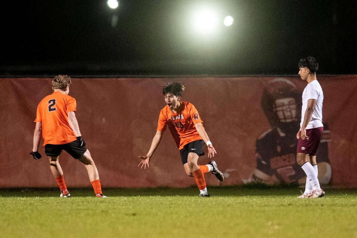 Merced junior Santiago Hernandez (10) celebrates after scoring a goal against Golden Valley at Merced High School in Merced, Calif., on Thursday, Jan. 11, 2024. The Cougars beat the Bears 3-1.