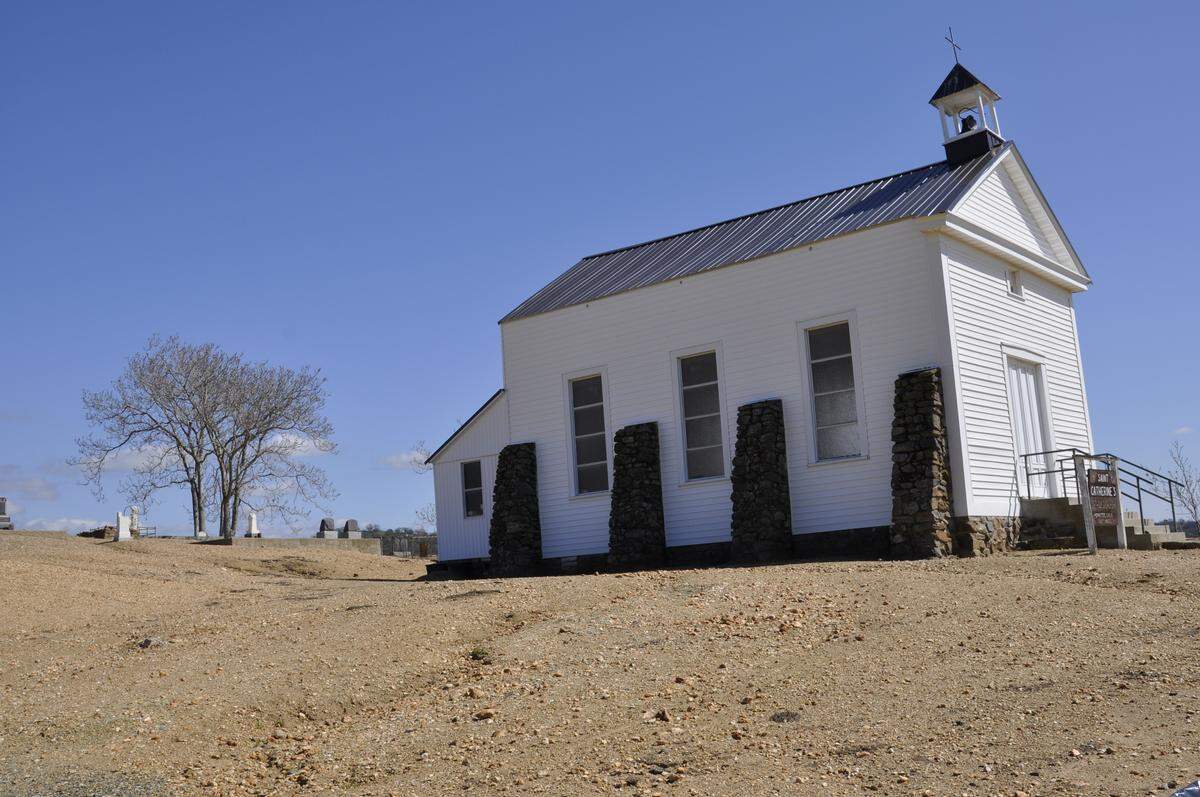 Saint Catherine’s Church stands on a hill overlooking the main street of Hornitos. Built in 1862, it’s a wood building, painted white, with rock buttresses and a steeple. The church also features an old cemetery that hosts a Dia De Los Muertos service on Nov. 2 every year. The service even draws attendees from outside the state. VICTOR A, PATTON vpatton@mercedsun-star.com