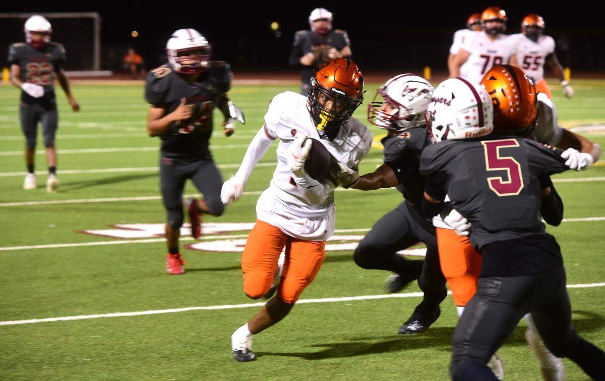 Merced High receiver Jordan Dupree (4) runs up the field after making a catch during a game against Golden Valley on Friday, Oct. 4, 2024 at Veteran Stadium.