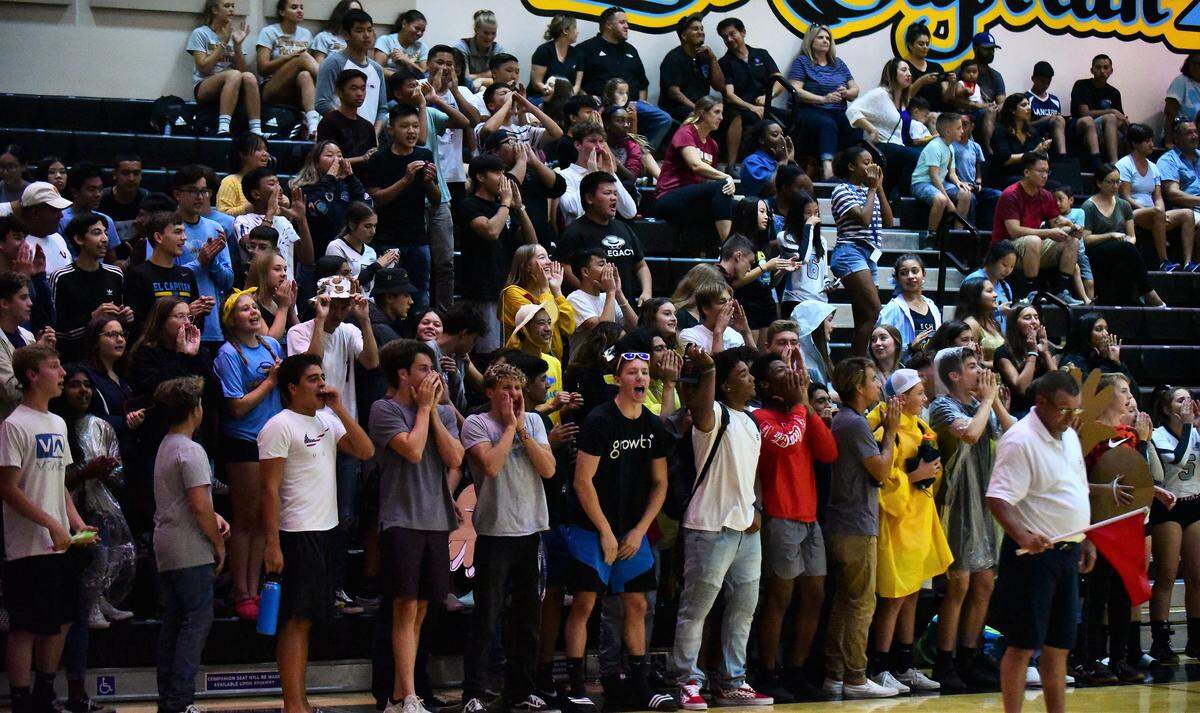 The El Capitan student section cheers on the Gauchos girls volleyball team to a 3-2 win over Buhach Colony on Wednesday night at the Stable Center.