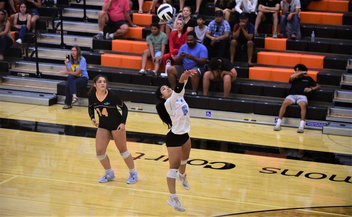 El Capitan High School senior Leah Mendoza (6) keeps a ball alive during a rally in a match against Merced on Wednesday, Sept. 7, 2022.
