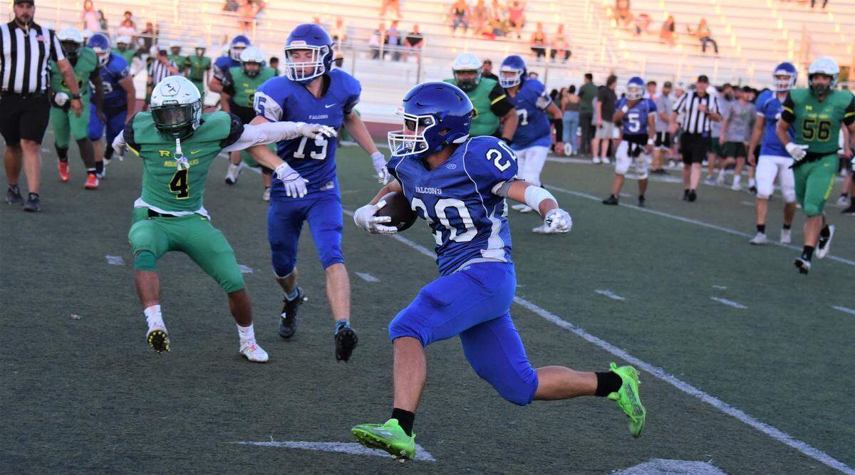 Atwater High School senior receiver Colin Williams runs with a ball during a scrimmage against Roosevelt High School on Friday, Aug. 12, 2022 at Dave Honey Stadium in Atwater, Calif.
