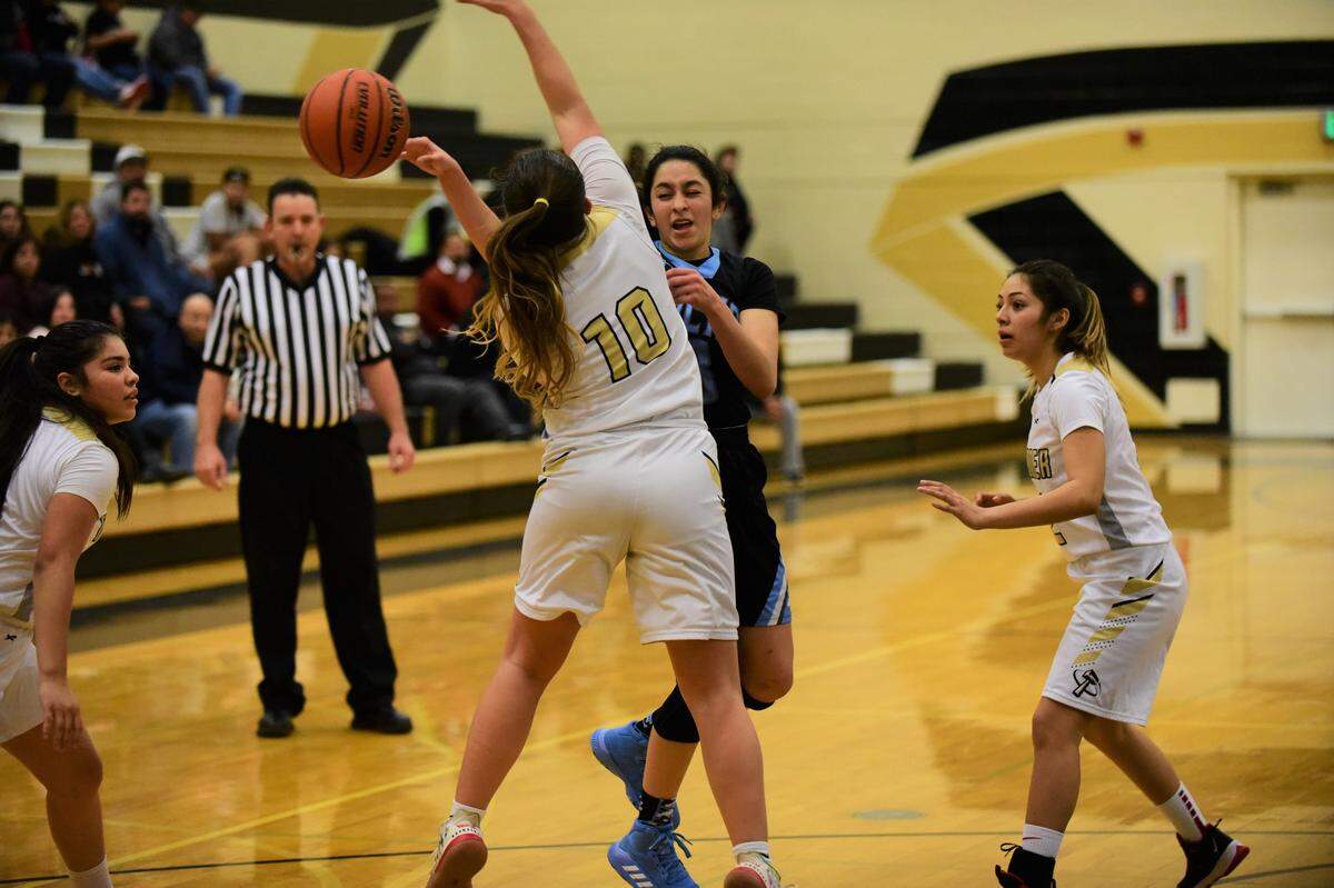El Capitan’s Daniela Belmonte collides with Buhach Colony’s Karlee King during a game on Tuesday, Jan. 7, 2020 at Thunder Arena.