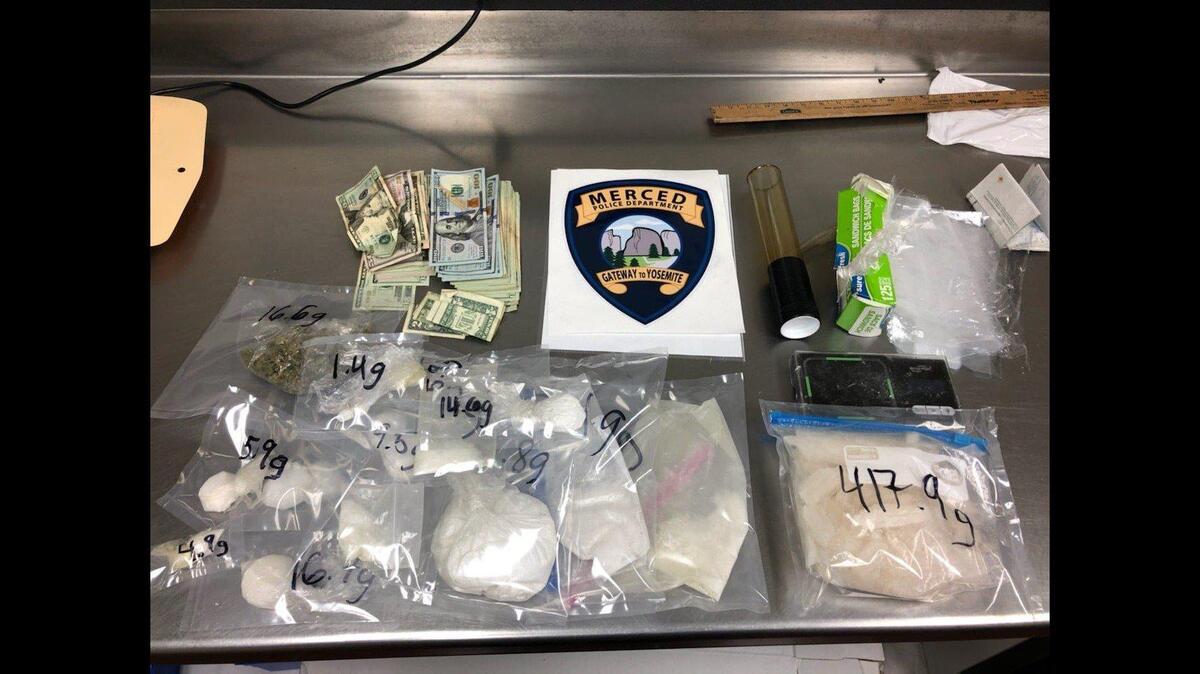 Two people were arrested Friday, Aug. 27, 2021, after Merced police officers located narcotics and money in a suspicious vehicle, according to authorities.