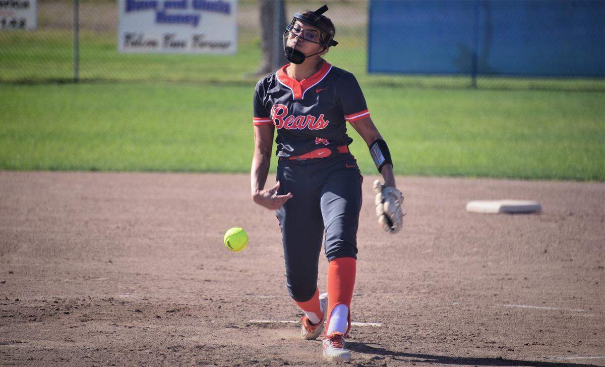 Merced High senior Melody Gomez first a pitch during a 1-0 victory over Atwater on Tuesday, April 12, 2022 at Atwater High School in Atwater, Calif.