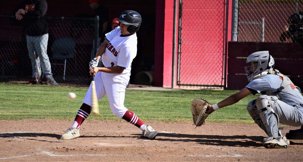Golden Valley sophomore Ryan Saechao hits a single during a game against Merced on Wednesday, April 13, 2022 at Doug Fister Field at Golden Valley High School in Merced, Calif.
