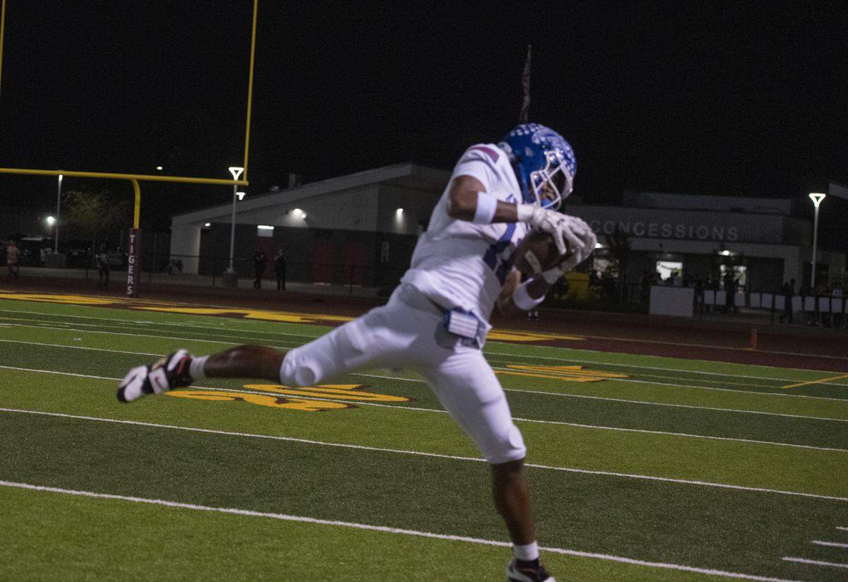 Atwater receiver Sylas Austin hauls in a catch against Los Banos on Friday, Oct. 31, 2025.