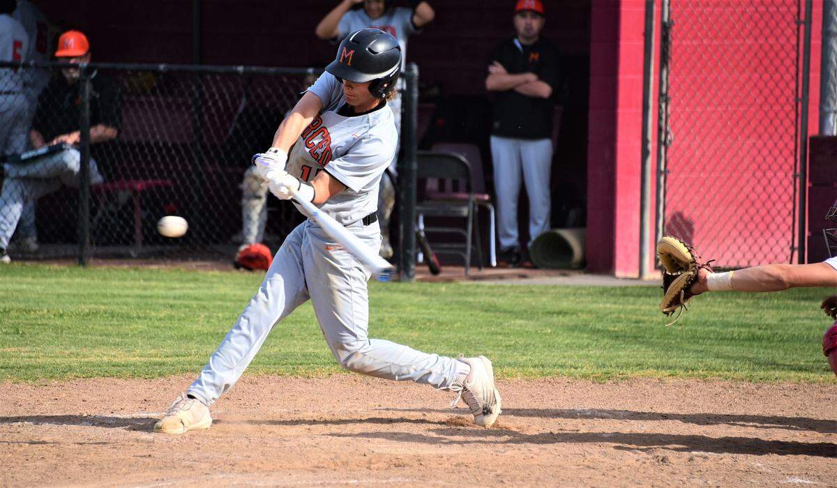 Merced High sophore Jason Zapata hits a single during a game against Golden Valley on Wednesday, April 13, 2022 at Doug Fister Field at Golden Valley High School in Merced, Calif.