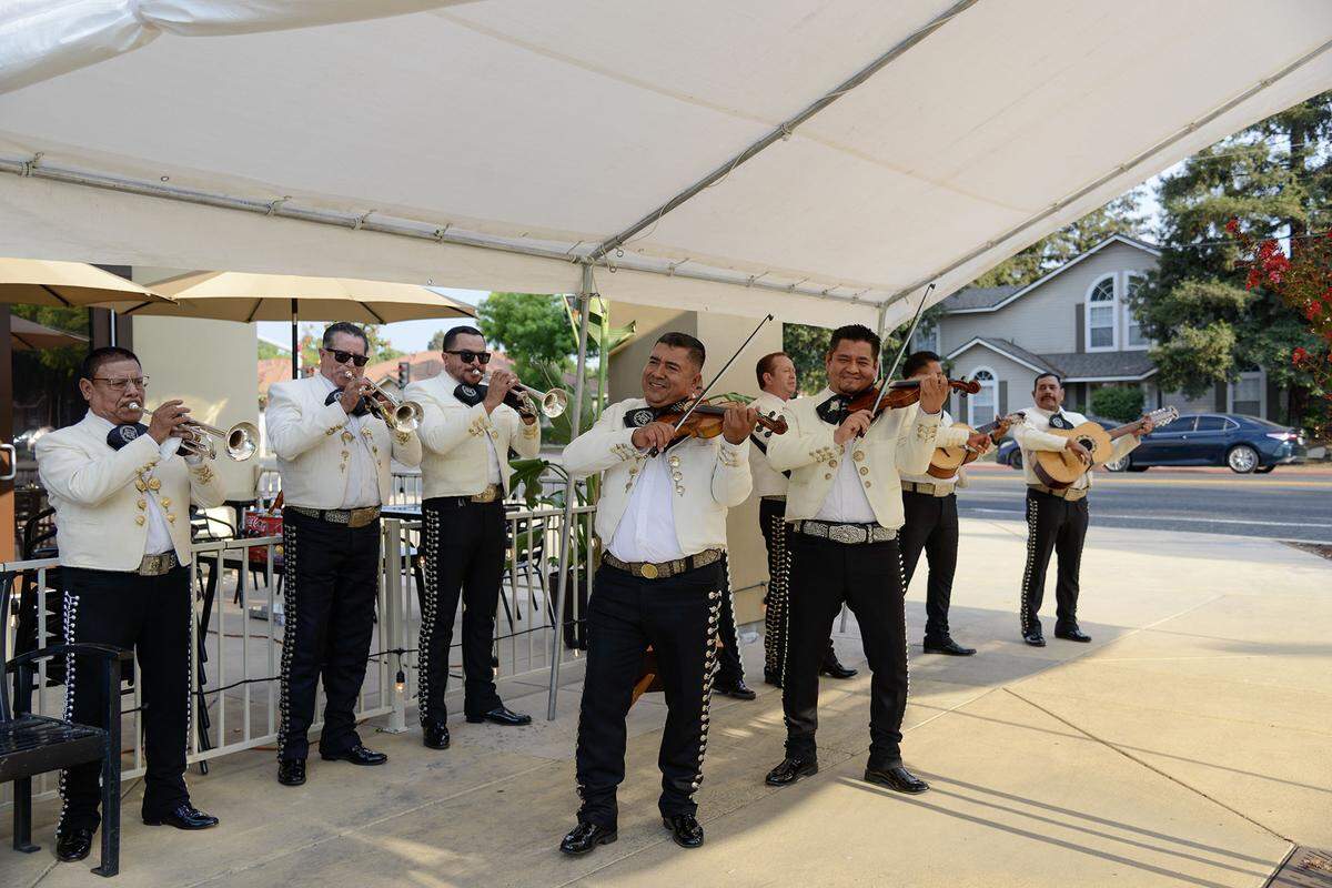 A mariachi band plays Friday June 12 for the grand opening of the newest Agaves Mexican Grill.