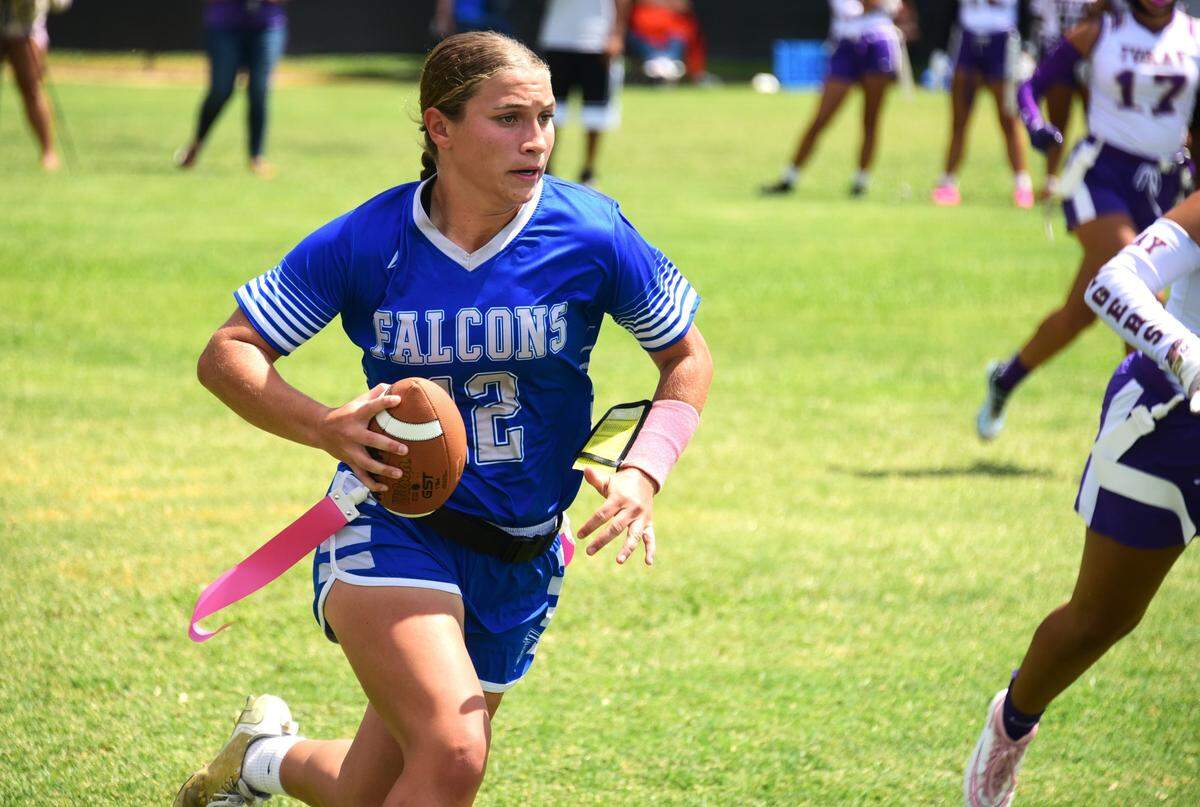 Atwater High School junior quarterback Madi Hiler runs the ball during a game against Tokay on Saturday, Aug. 24, 2024 at Merced High School.