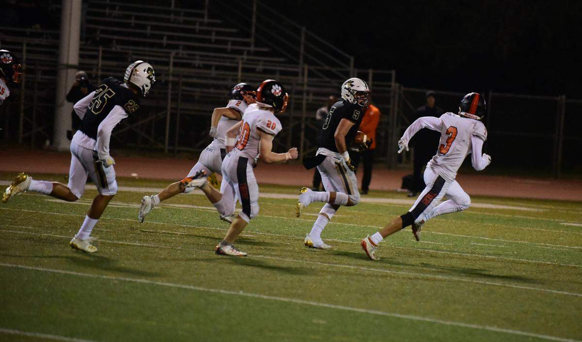 Buhach Colony senior Nate Ruiz breaks free for a 51-yard run during the Thunder’s 45-27 win over Roseville on Friday, Nov. 15, 2019 at Dave Honey Stadium.