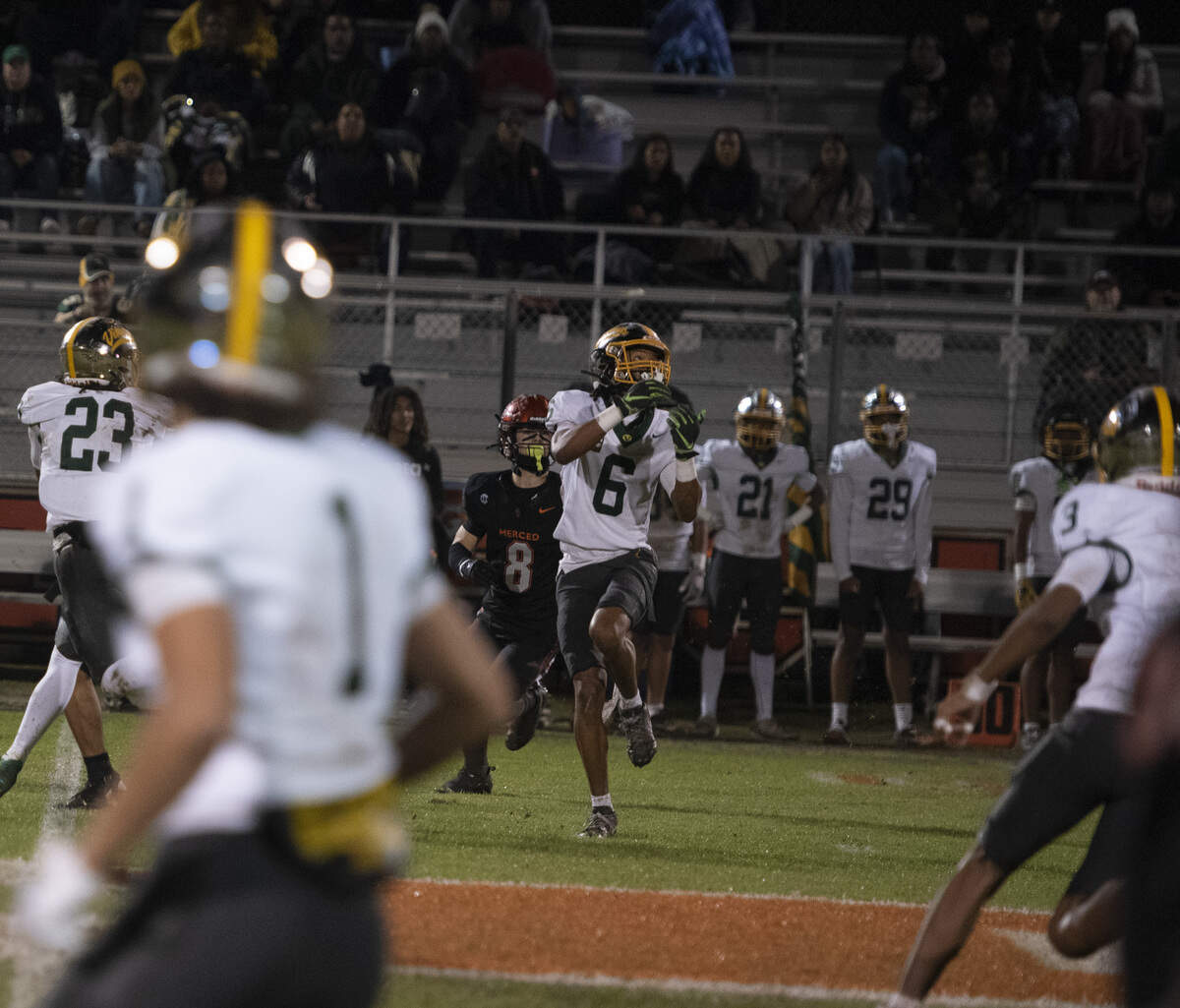 Vanden senior captain Caleb Jones returns an interception in the first quarter against Merced during a Sac-Joaquin Section Division III playoff game on Friday, Nov. 14, 2025, at Cathie Hostetler Stadium in Merced. Jones added a fumble return for a touchdown in the Vikings’ 26-25 win.