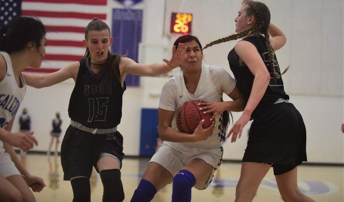 Atwater High senior Mariela Fernandez drives to the basket during a playoff game against Tracy on Thursday, Feb. 17, 2022. Fernandez scored 20 points to help the Falcons win 71-52.