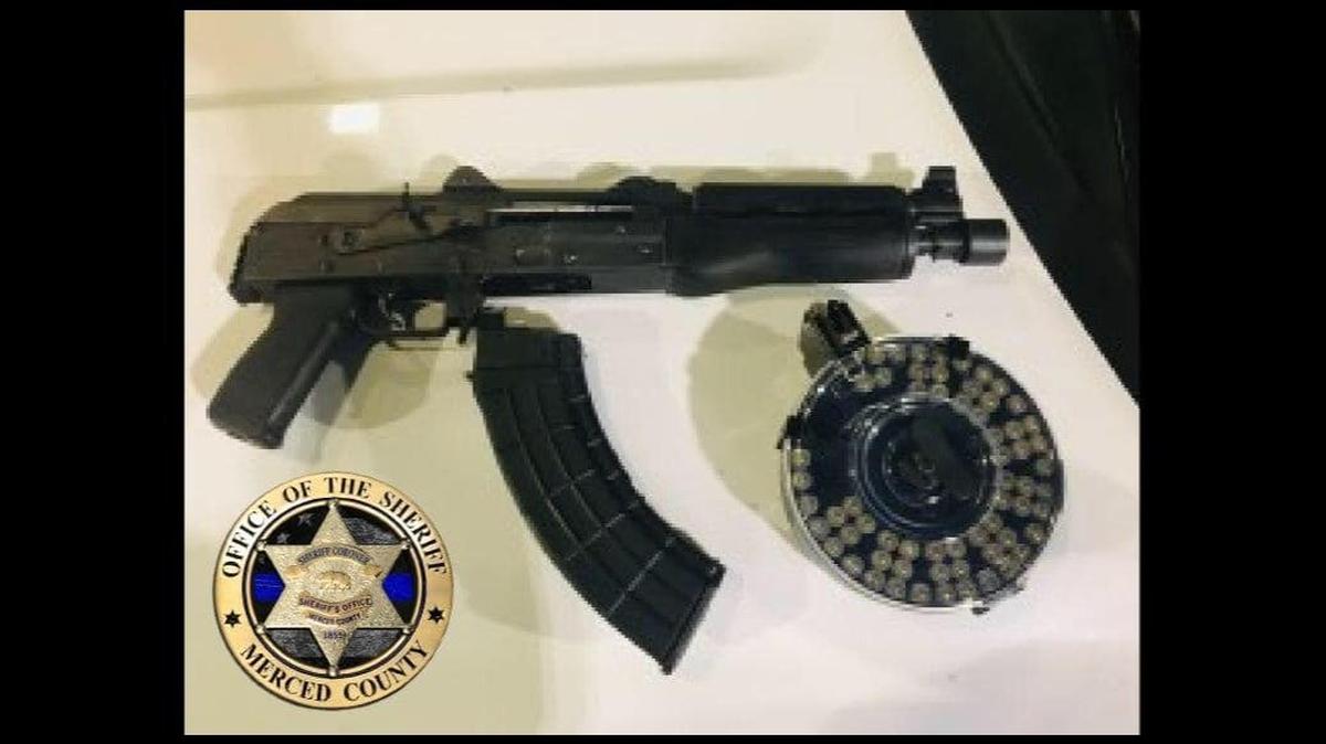 A driver was arrested on suspicion of driving under the influence and assault weapon charges during a Merced County traffic stop after the driver allegedly failed to stop at a stop sign and nearly struck a patrol vehicle in the area of Kraft Road and Arguello Drive in Planada on Wednesday, according to the Merced County Sheriff’s Office. Authorities said deputies located the firearm, ammunition and empty beer bottles inside the vehicle while making contact with the driver. Image courtesy of Merced County Sheriff’s Office.