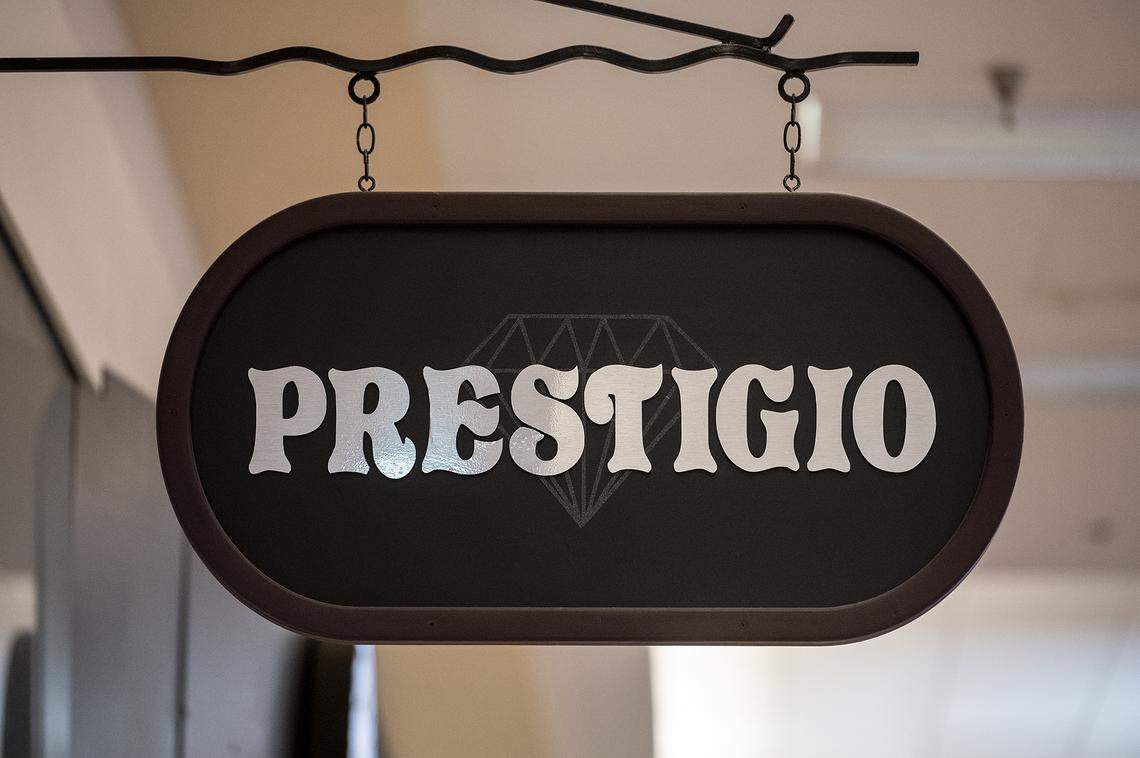 Work is performed inside Prestigio Jewelers at the Merced Mall in Merced, Calif., on Thursday, Feb. 10, 2022, as the business prepares to reopen after thieves stole more than $100,000 in merchandise during a smash-and-grab robbery two days earlier.