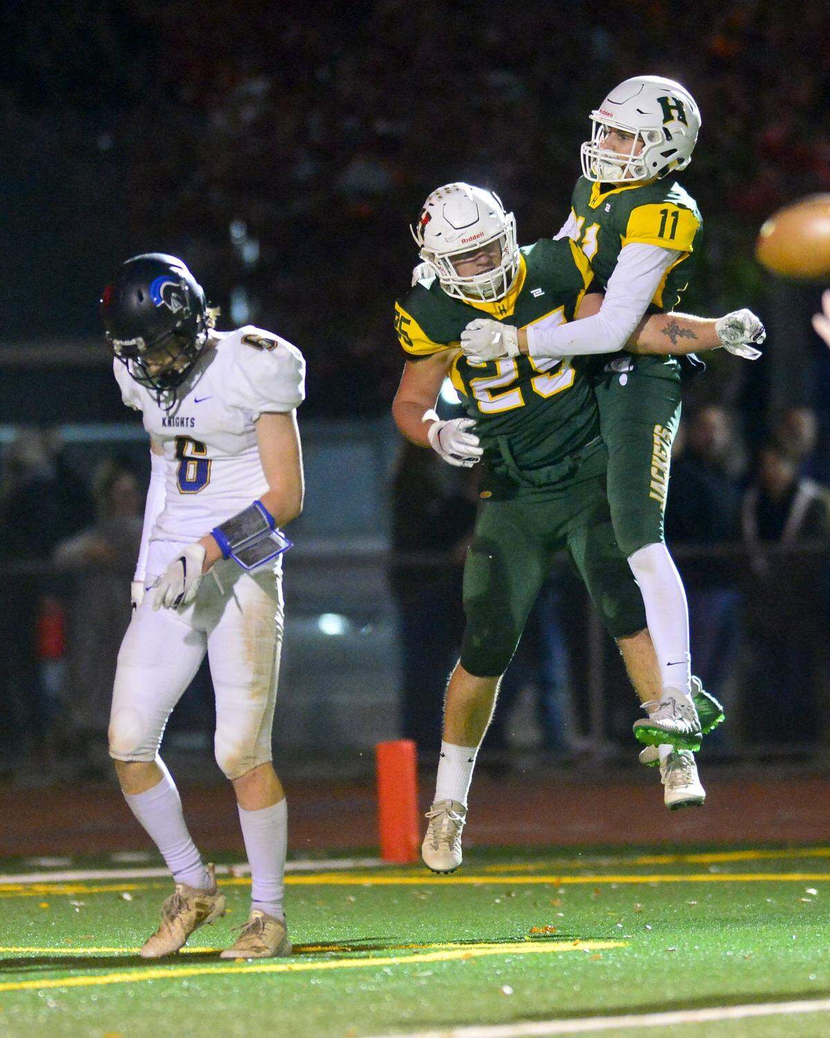 Hilmar’s Justin Rentfro and Aiden Azevedo celebrate a touchdown during the Division VI CIF Sac-Joaquin championship game between Ripon Christian and Hilmar at Turlock High School in Turlock CA on November 30, 2018.
