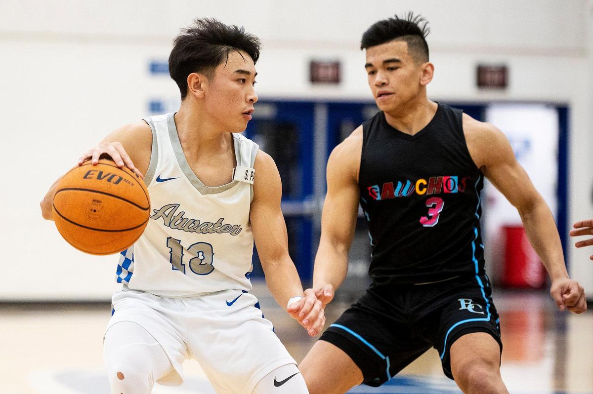 Atwater senior Khoi Nguyen (13) dribbles up the court during a game against El Capitan at Atwater High School in Atwater, Calif., on Wednesday, Jan 17, 2024.