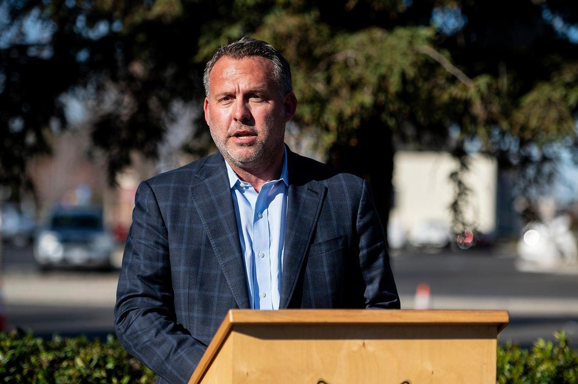 California State Assemblymember Adam Gray presents California Highway Patrol K-9 Officer Beny and his handler with a California State Assembly Resolution recognizing his service in the apprehension of narcotics and criminals throughout the state in Atwater, Calif., on Thursday, Feb. 24, 2022.