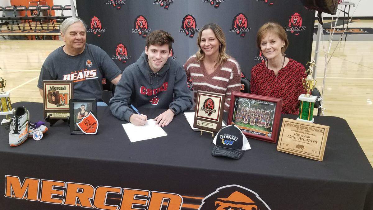 Merced High senior Cole McKain recently celebrating his signing a national letter of intent with Cal State East Bay at Merced High School. He’s joined at the table (from left to right) by his grandfather Kim Broughton, mother Kelly McKain and grandmother Pam McKain.