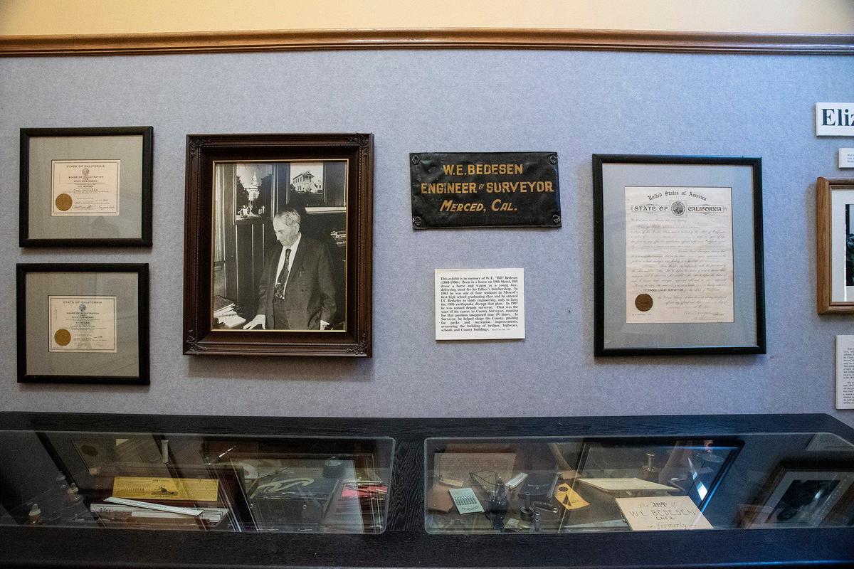 An exhibit in memory of W.E. “Bill” Bedesen, who was one of four students in Merced’s first high school graduating class and went on to serve as County Surveyor, at the Merced County Courthouse Museum in Merced, Calif., on Thursday, Aug. 22, 2024. Built in 1875, the building served as a courthouse until 1950 and as a county administration building until 1970. The building opened as a history museum in 1983.
