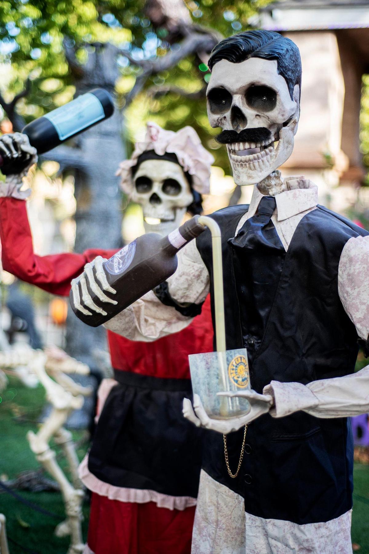 Halloween decorations fill the yard of Miguel Avila, 28, at his home on West 9th Street in Merced, Calif., on Thursday, Oct. 17, 2024.