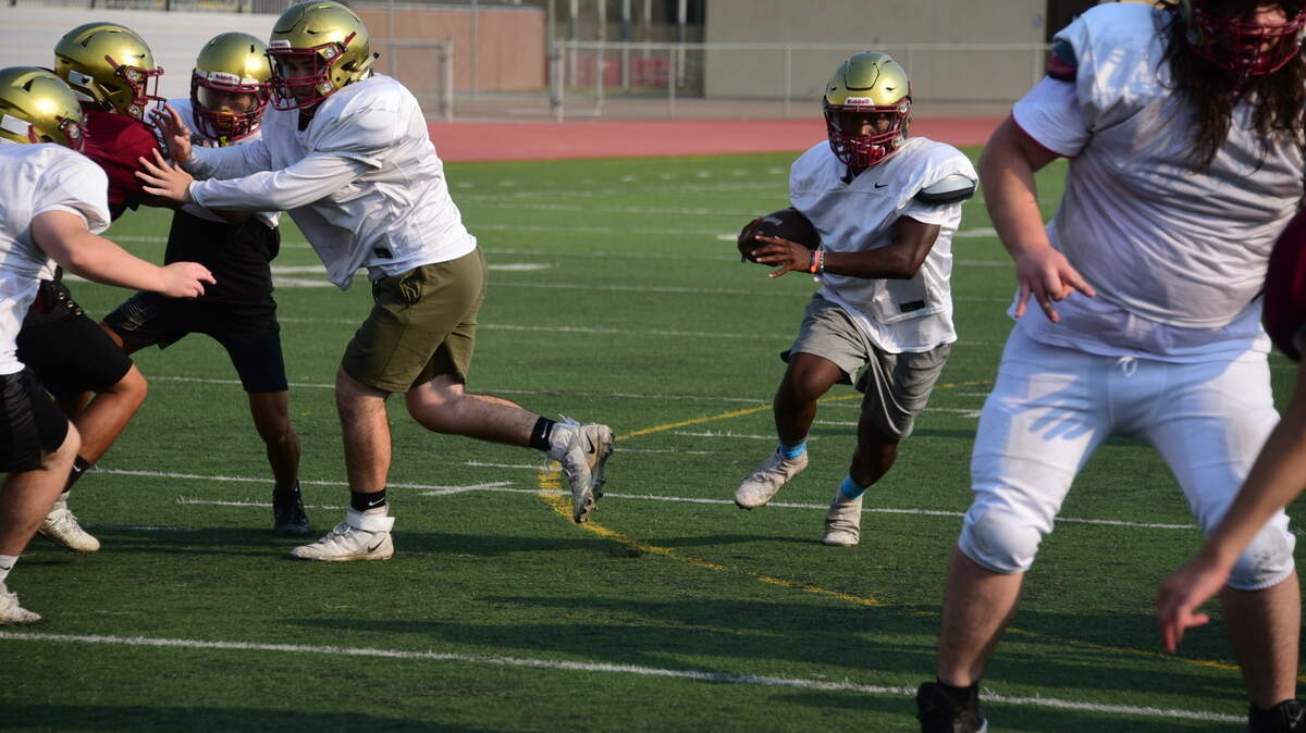 Golden Valley running back Jabari Phillips runs the ball through practice on Tuesday, Aug. 18, 2021.